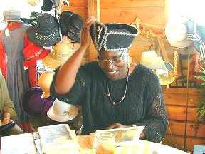 CORNELIA'S AUTOGRAPHING HAT SANDY JONES